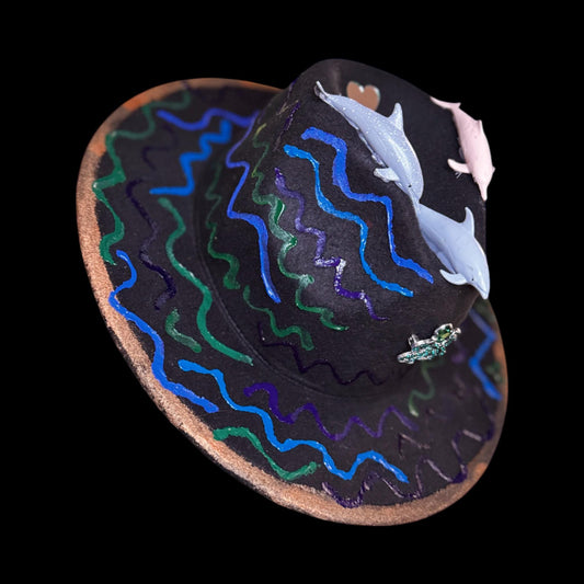 Hand-painted one-of-a-kind festival hat by Qreine, UV reactive glow