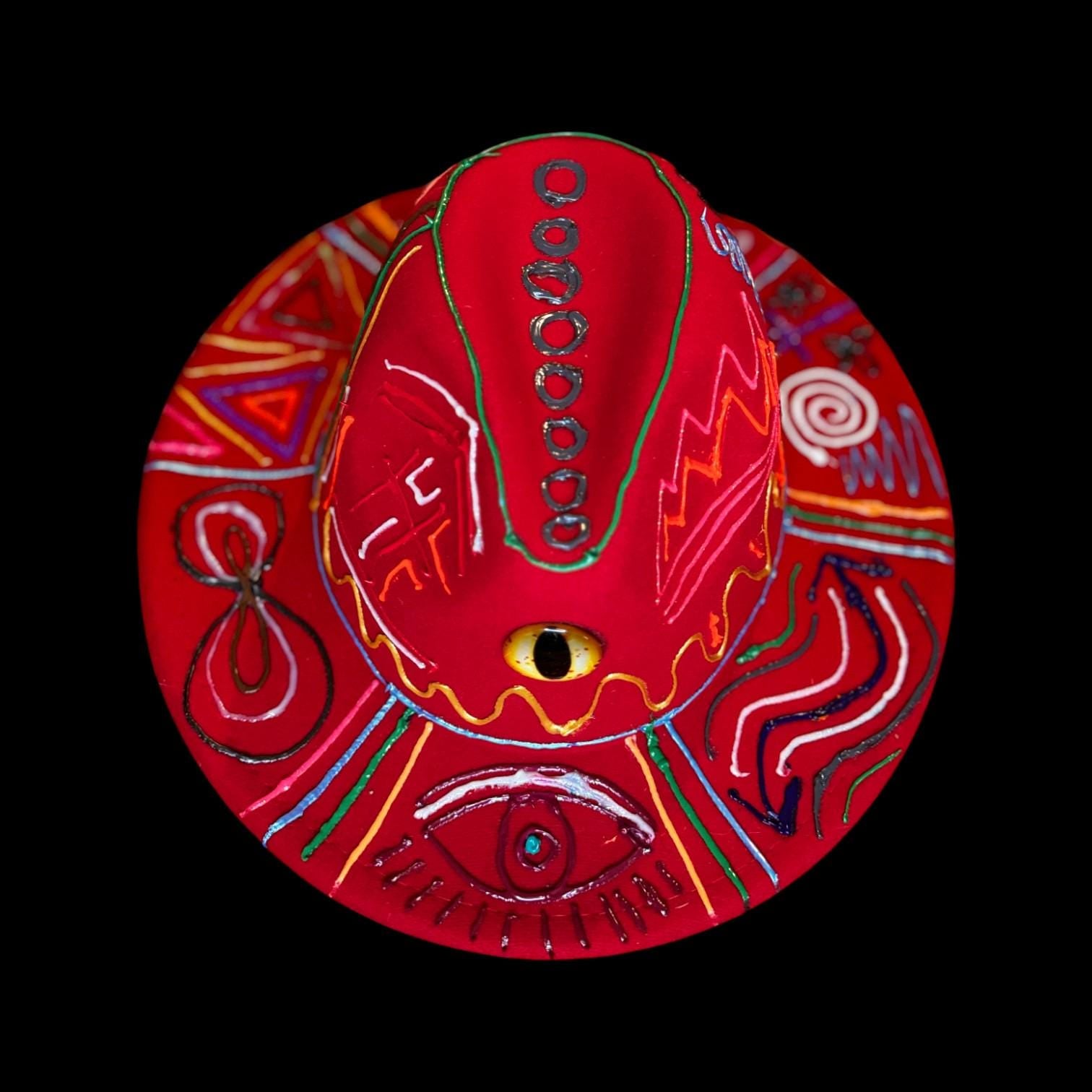 Hand-painted red festival hat with mystic eye & neon UV-reactive symbols | Psychedelic spiritual rave hat | Qreine wearable art